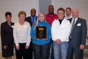 Facility Logistic Services receives the Spirit Award. From left to right; front row- Deborah McNeill, Cleta Ramsey, Paula Bruff, Pam Stepp, Eric Myers. Back row- Darrell McNeill, Warren Hairston and Billy Franklin.